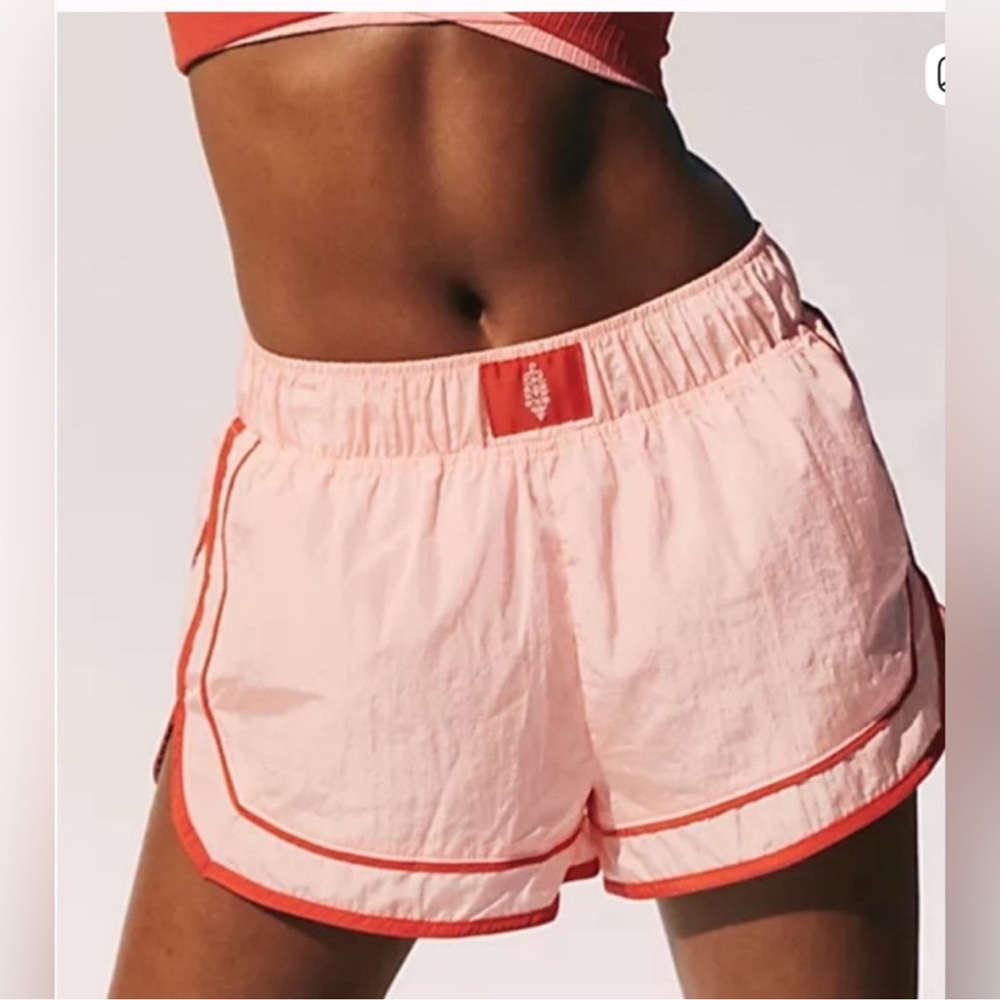 Free People Movement Varsity Blues
Shorts. NWT. Pastel peach